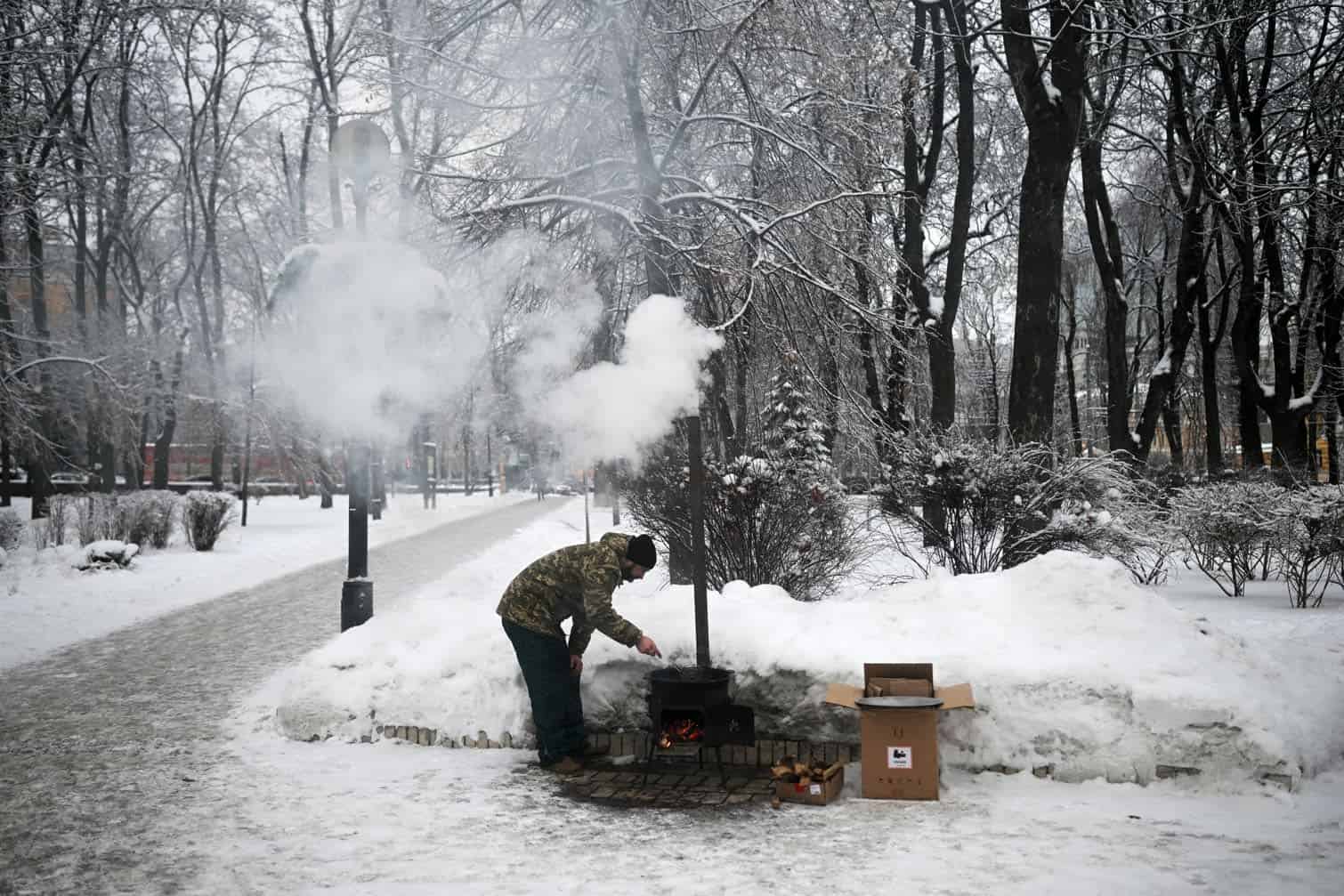 Volunteer Yevgen Gutman cooks baursak