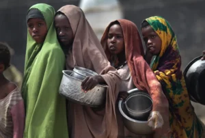 Somali-refugees-food-aid-near-Mogadishu-airport-2011-e1761318051318.webp