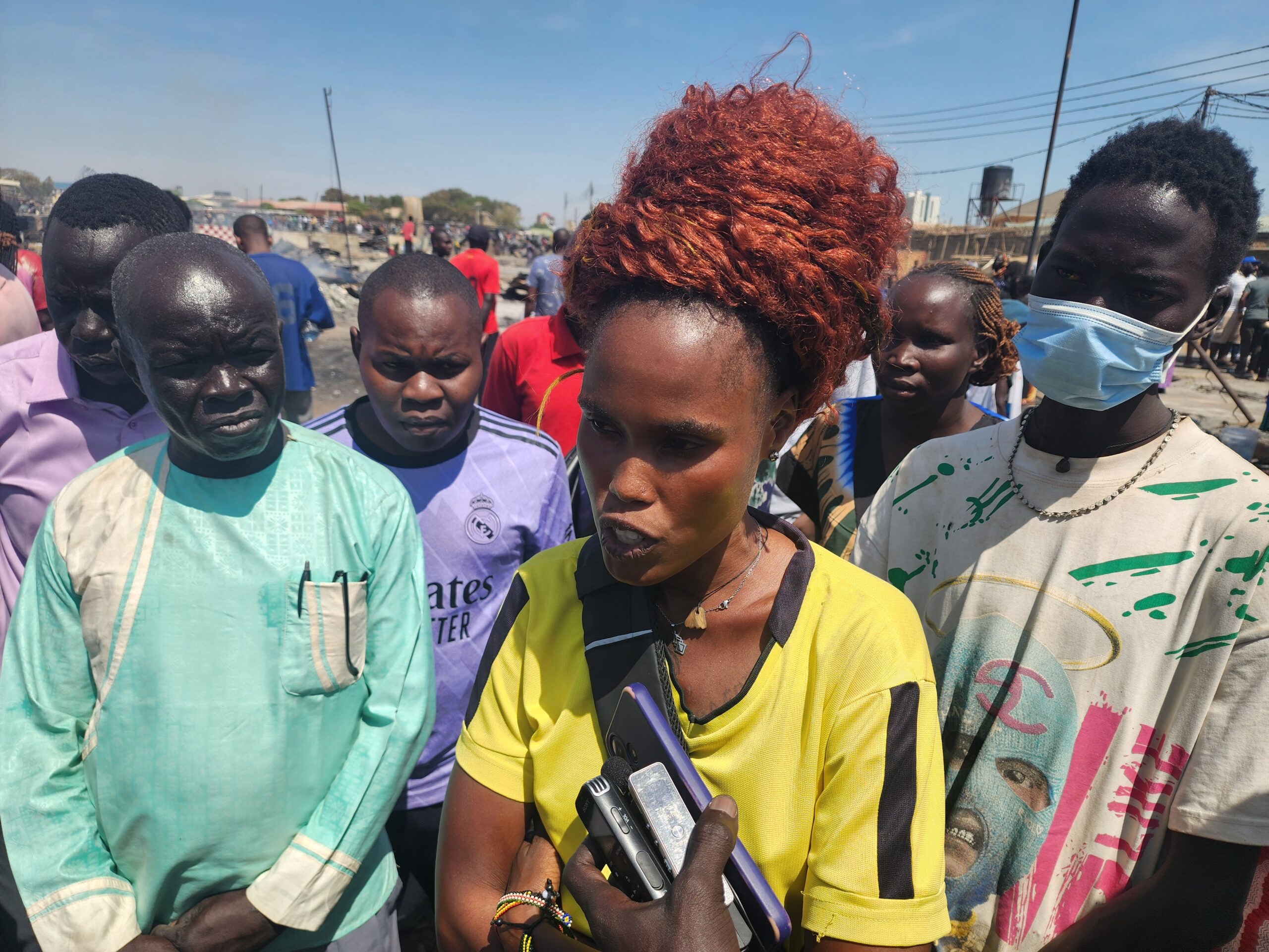 Trader Teresa John speaks to the media on Thursday, December 4, 2025. [Photo by Sudans Post]